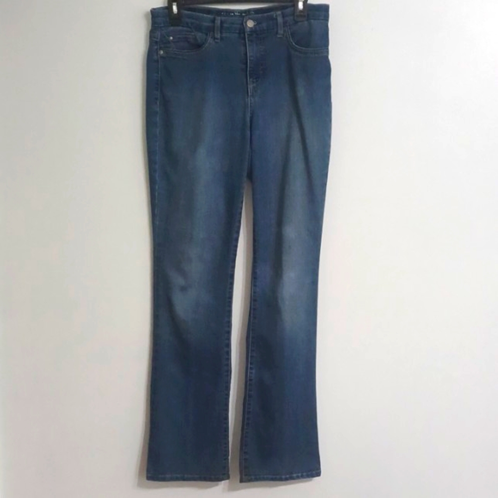 Size 6 Jordyn faded denim blue jeans. "Curvy Barely Boot" Distressed Slimming